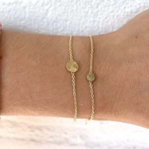 Deze armbanden van Minioro zijn gemaakt van 14 karaats goud. Dit item is afgewerkt met een vingerafdruk. Zo heb je echt persoonlijke en unieke sieraden.