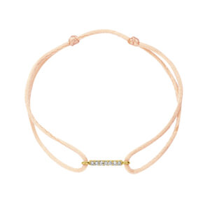 Deze armband van Minioro is gemaakt van 14 karaats goud. Dit item heeft een bedel die is ingelegd met prachtige diamanten. Zo heb je echt een persoonlijk en uniek sieraad.